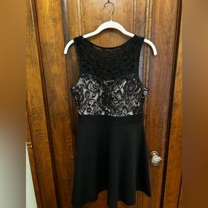 Black lace dress from Macy’s with thick black lining and nude liner.